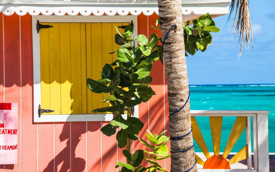 Colorful buildings on the beach at Grace Bay