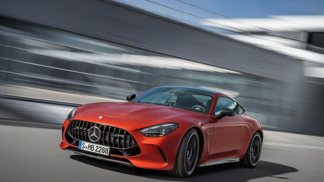 a red sports car on a road