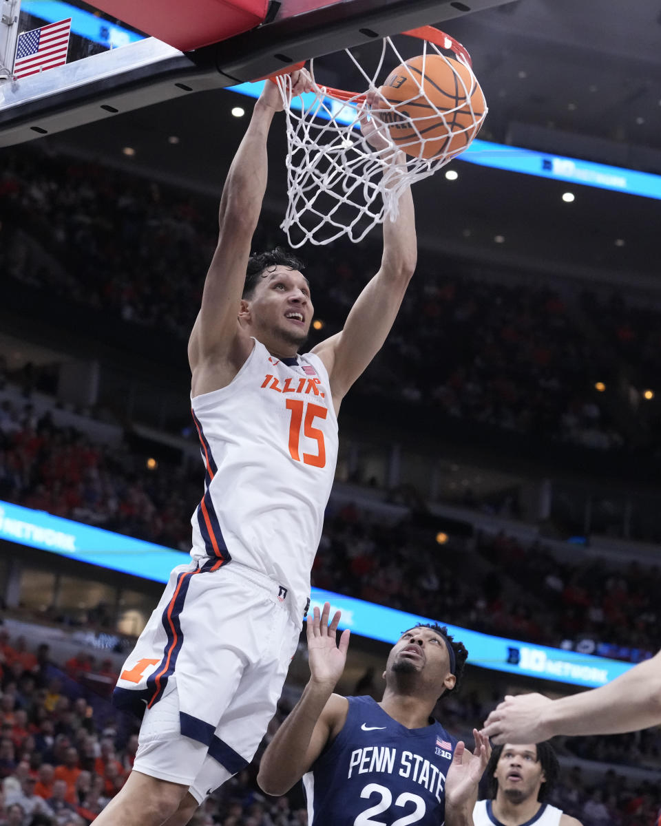 Illinois's RJ Melendez dunks the ball during the second half of an NCAA college basketball game against Penn State at the Big Ten men's tournament, Thursday, March 9, 2023, in Chicago. Penn State won 79-76. (AP Photo/Charles Rex Arbogast)