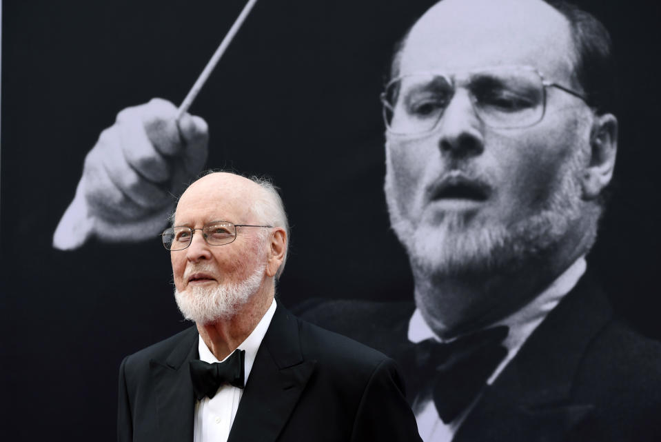 FILE - In this June 9, 2016, file photo, composer John Williams poses on the red carpet at the 2016 AFI Life Achievement Award Gala Tribute to John Williams at the Dolby Theatre in Los Angeles. The composer of the music scores for “Star Wars,” “Indiana Jones” and other iconic films is being honored by his former orchestra. The Boston Pops Orchestra is kicking off a series of performances devoted to the music of John Williams with concerts on April 7 and 8, 2017. Williams served as the ensemble’s conductor from 1980 to 1993 and is its conductor laureate. (Photo by Chris Pizzello/Invision/AP, File)