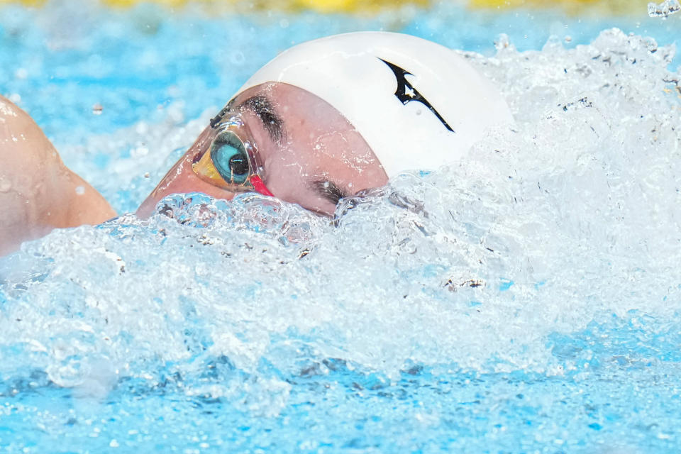 James Hendrix of Guam competes in the men's 100-meter freestyle heat at the World Aquatics Championships in Doha, Qatar, Wednesday, Feb. 14, 2024. (AP Photo/Hassan Ammar)