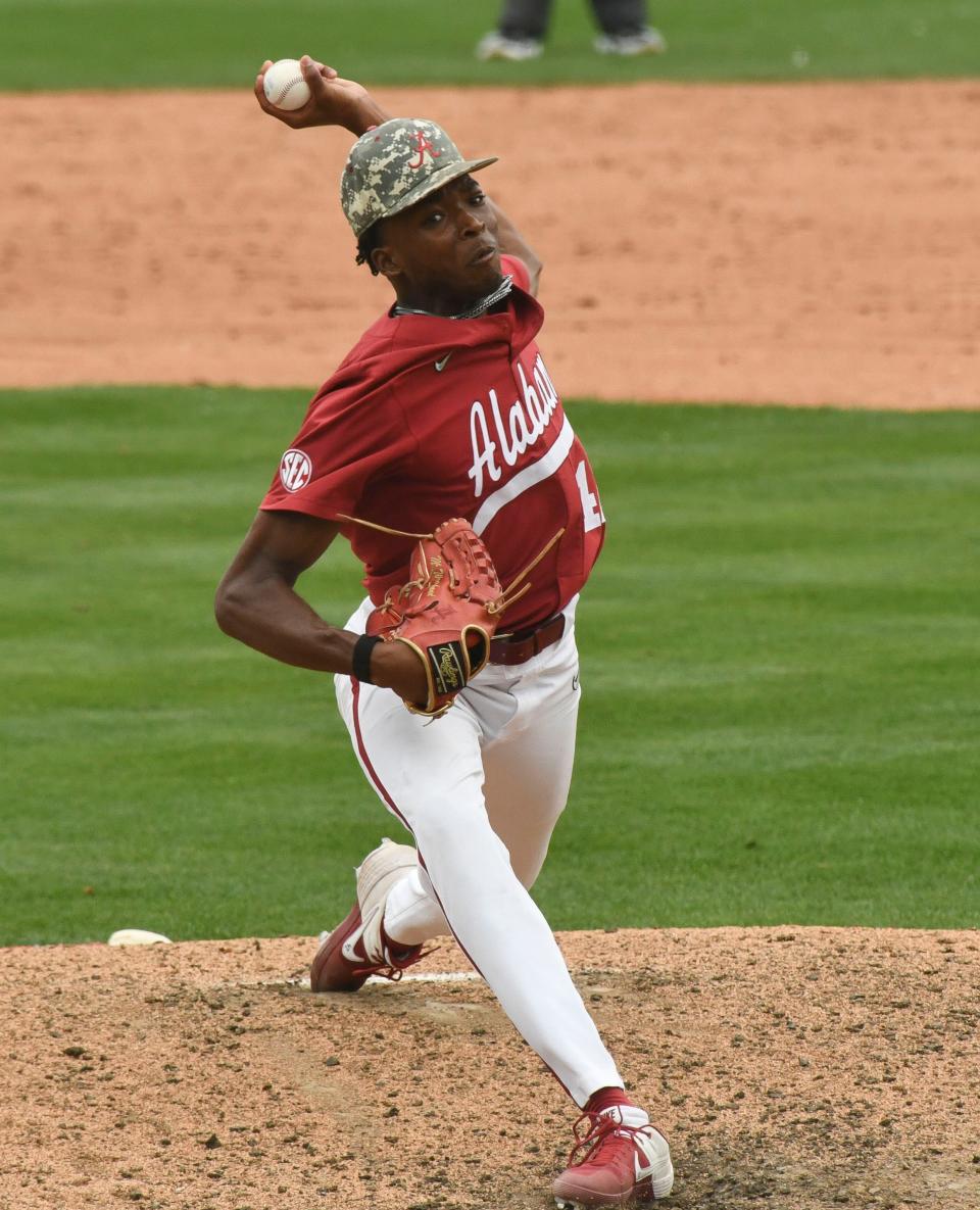 Alabama pitcher Alton Davis II (42) pitches the final inning in the Crimson TideÕs victory over Vanderbilt. Alabama defeated Vanderbilt 2-1 to claim the weekend series two games to one Saturday May 6, 2023, at Sewell-Thomas Stadium. 