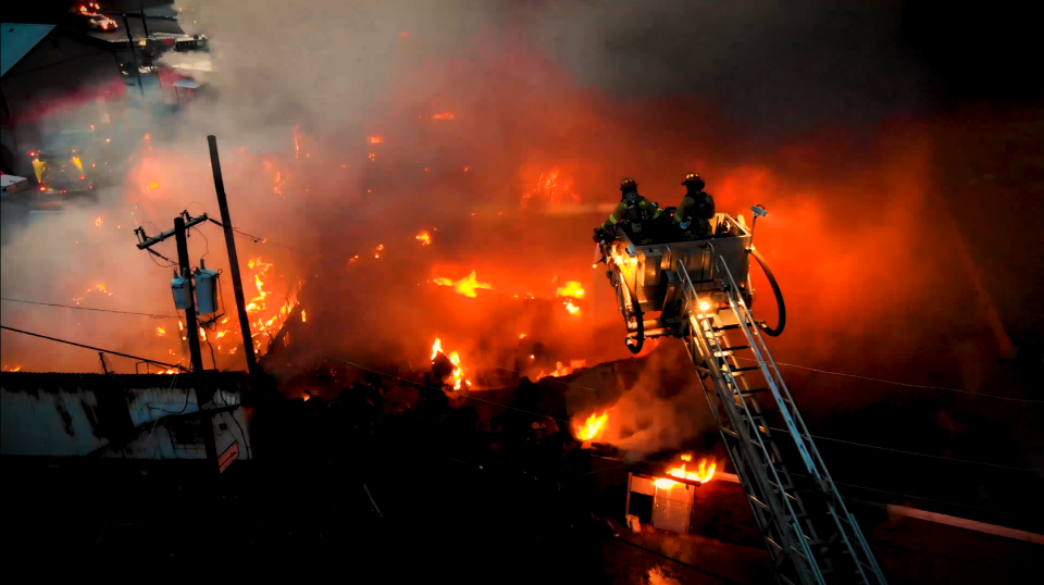 Chatham Emergency Services firefighters battle a blaze.