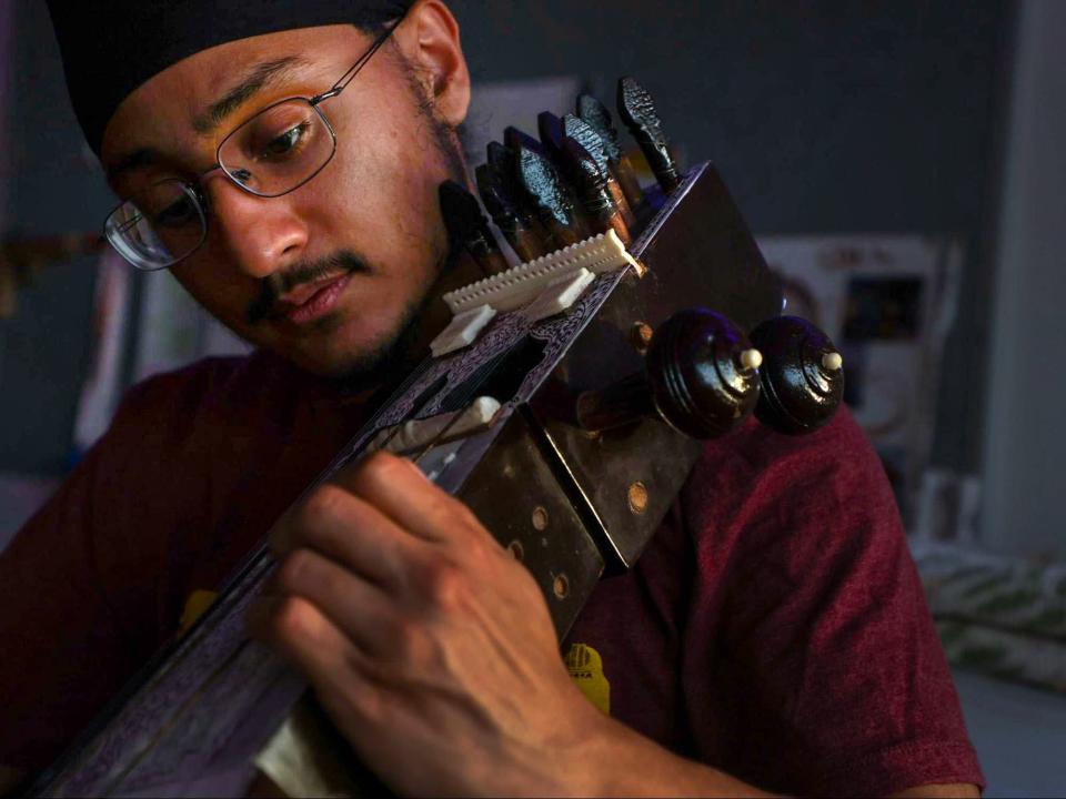 Simardeep Singh practices in his dorm room on March 6, 2023, Los Angeles, CA, USA.