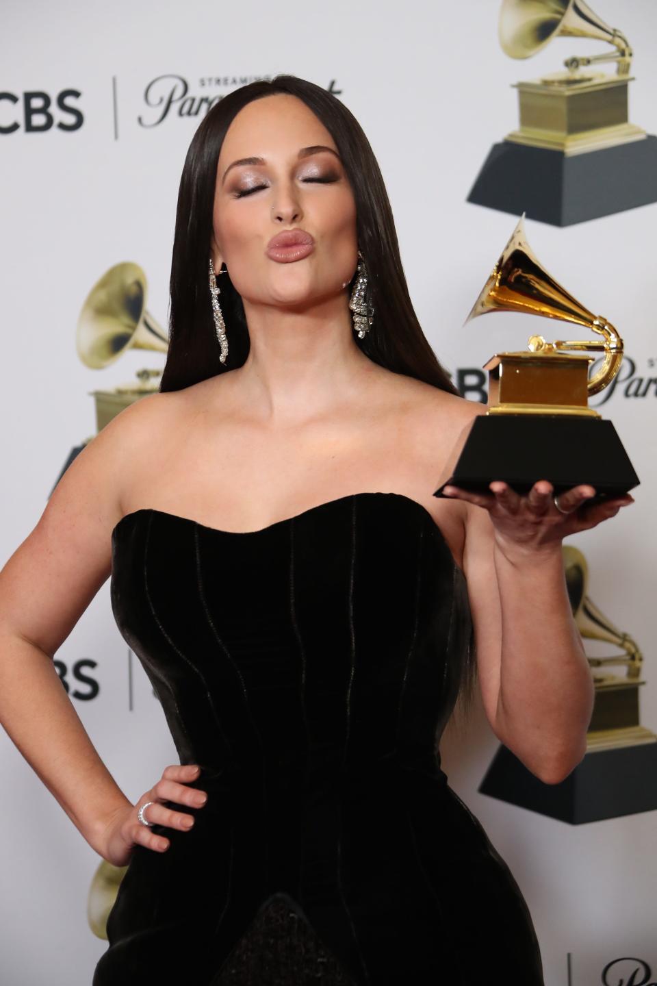 Feb 4, 2024; Los Angeles, CA, USA; Kacey Musgraves, winner of Country Duo/Group Performance for ‘I Remember Everything’ with Zach Byran, at the 66th Annual Grammy Awards at Crypto.com Arena in Los Angeles on Sunday, Feb. 4, 2024.. Mandatory Credit: Dan MacMedan-USA TODAY