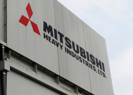 The logo of Mitsubishi Heavy Industries is seen at the company's Sagamihara plant in Sagamihara, Japan, July 4, 2016. REUTERS/Maki Shiraki