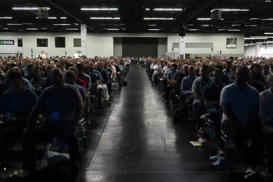 Attendees listen to Bruce Frank, a chair of the Southern Baptist Convention's sexual abuse task force, during its annual meeting in Anaheim, Calif., Tuesday, June 14, 2022. (AP Photo/Jae C. Hong)