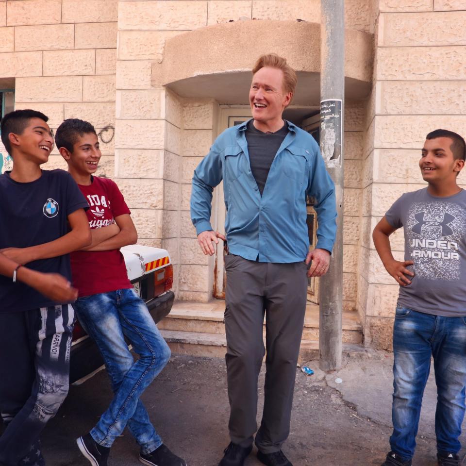 <p>Hanging with some Palestinian children in the West Bank Aida Refugee Camp. They are not impressed with my showbiz stories. #Palestine (Photo: Conan O’Brien via Twitter) </p>