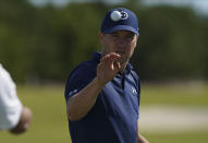 Jordan Spieth, of the United States, catches a ball during a practice session on day three of the Hero World Challenge PGA Tour at the Albany Golf Club, in New Providence, Bahamas, Saturday, Dec. 4, 2021.(AP Photo/Fernando Llano)