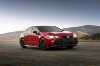 <p>The visuals pick up where that sporty-ish XSE model leaves off, with additions such as a body kit with a front splitter and a rear diffuser, red brake calipers, red badges.</p>