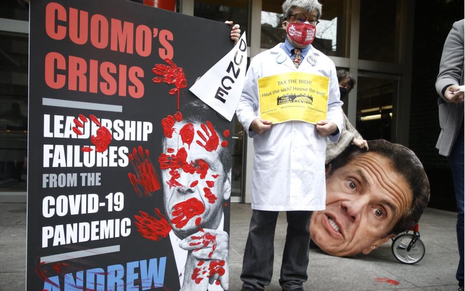 Demonstrators gather in front of New York Governor Andrew Cuomo's office - John Lamparski/Shutterstock