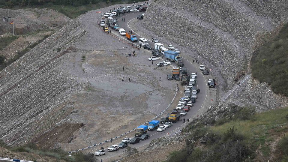 Thousands tried to flee Nagorno-Karabakh at once, causing long lines on the road to Armenia. - Vasily Krestyaninov/AP