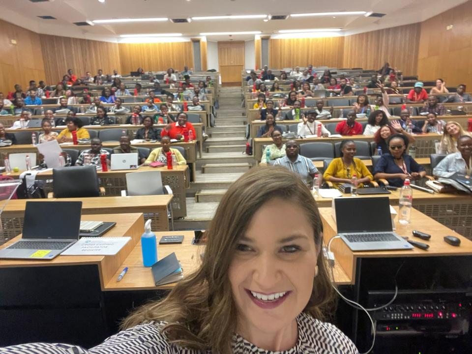 Abby Finkenauer, special envoy for the State Department's Global Youth Issues Office, takes a selfie when visiting the Regional Learning Center in South Africa in March 2023.