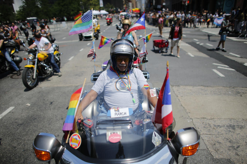 <p>A reveler rides a motorcycle in the annual Pride Parade on June 24, 2018 in New York City. (Photo: Kena Betancur/Getty Images) </p>