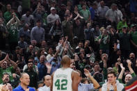 Fans applaud after a drive to the basket by Boston Celtics center Al Horford (42) during the second half of Game 4 of the NBA basketball playoffs Eastern Conference finals against the Miami Heat, Monday, May 23, 2022, in Boston. (AP Photo/Charles Krupa)