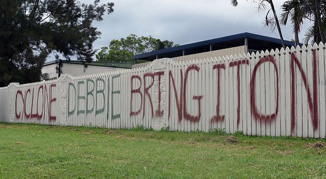 Bowen resident puts out a greeting for Cyclone Debbie. Source: AAP