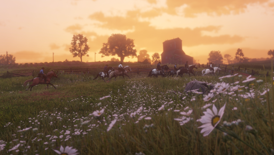 Cabalgando al atardecer en <em>Red Dead Redemption 2</em>. <a href="https://www.rockstargames.com/reddeadredemption2/es/screens" rel="nofollow noopener" target="_blank" data-ylk="slk:Rockstar Games;elm:context_link;itc:0;sec:content-canvas" class="link ">Rockstar Games</a>