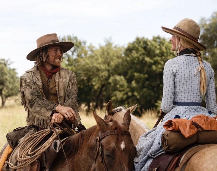 Eric Nelsen on the "1883" set with Isabel May, who plays his love interest, Elsa Dutton.