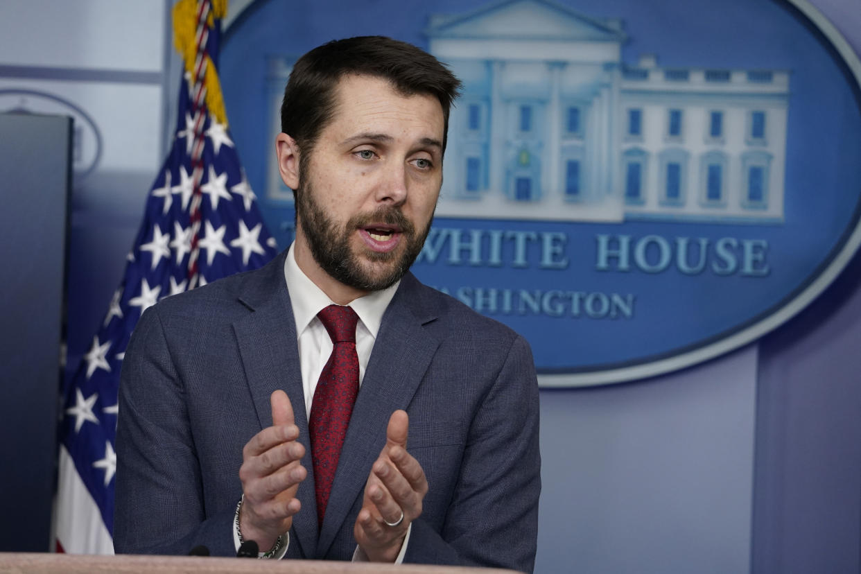 National Economic Council Director Brian Deese speaks during a press briefing at the White House, Friday, Jan. 22, 2021, in Washington. (AP Photo/Evan Vucci)