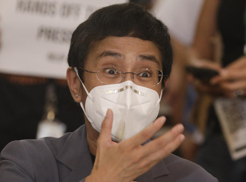 Rappler CEO and Executive Editor Maria Ressa gestures during a press conference in Manila, Philippines on Monday June 15, 2020. Ressa, an award-winning journalist critical of the Philippine president, her online news site Rappler Inc. and Santos were convicted of libel and sentenced to jail Monday in a decision called a major blow to press freedom in an Asian bastion of democracy. (AP Photo/Aaron Favila)
