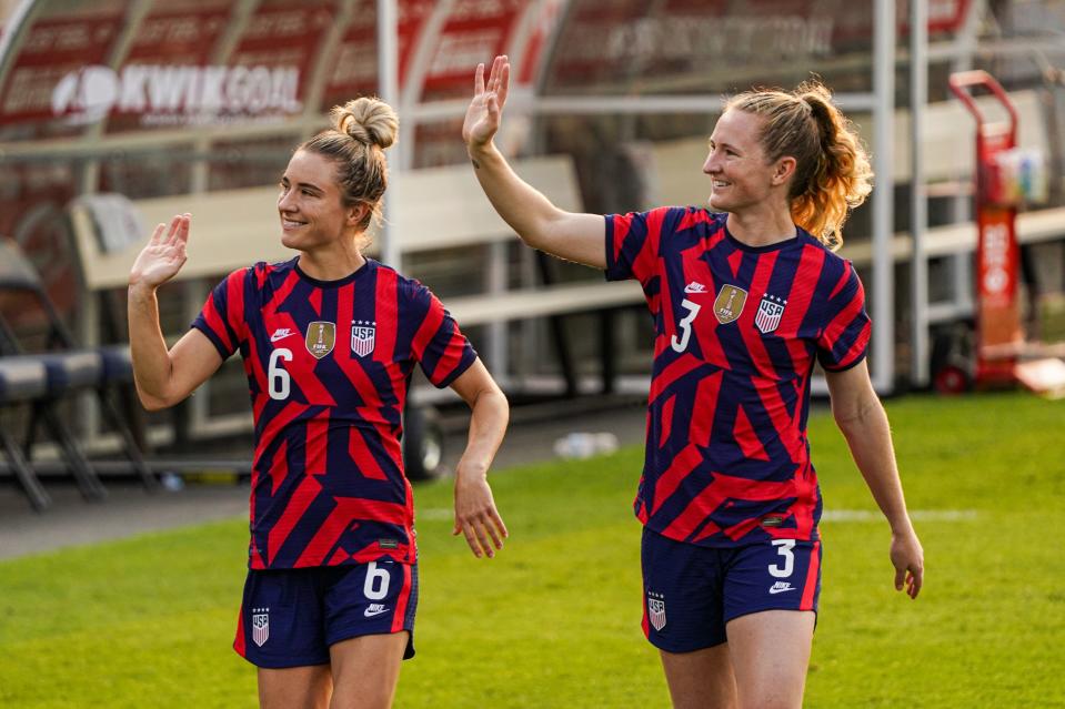 From left, USA midfielder Kristie Mewis and her sister USA midfielder Samantha Mewis exit the field after a send off celebration and defeat of Mexico during a USWNT Send-off Series soccer match at Pratt & Whitney Stadium, in East Hartford, Connecticut. USA defeated Mexico 4-0 on July 5, 2021.