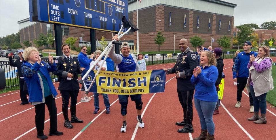 Bill Murphy completes his 2021 Boston Marathon virtually on crutches at Worcester State.