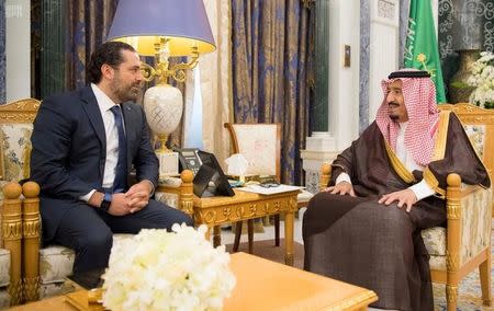 FILE PHOTO: Saudi Arabia's King Salman bin Abdulaziz Al Saud meets with former Lebanese Prime Minister Saad al-Hariri in Riyadh, Saudi Arabia November 6, 2017. Saudi Press Agency/Handout via REUTERS/File Photo