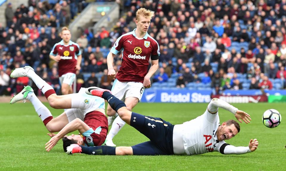 <p>Tottenham’s Vincent Janssen goes down as Burnley’s Ben Mee looks on </p>