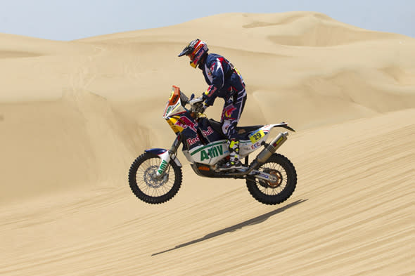 KTM rider Kurt Caselli of the U.S. competes in the 1st stage of the 2013 Dakar Rally near Pisco, Peru, Saturday, Jan. 5, 2013. The race finishes in Santiago, Chile, on Jan. 20. (AP Photo/Victor R. Caivano)