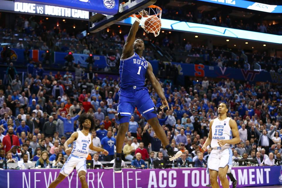 Mar 15, 2019; Charlotte, NC, USA; Duke Blue Devils forward Zion Williamson (1) dunks the ball in the second half against the North Carolina Tar Heels in the ACC conference tournament at Spectrum Center. Mandatory Credit: Jeremy Brevard-USA TODAY Sports