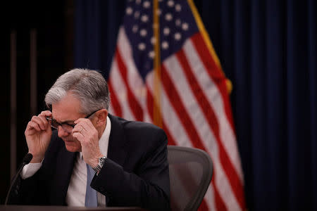 Federal Reserve Chairman Jerome Powell reacts at a news conference following the Federal Open Market Committee meetings in Washington, U.S., March 21, 2018. REUTERS/Aaron P. Bernstein