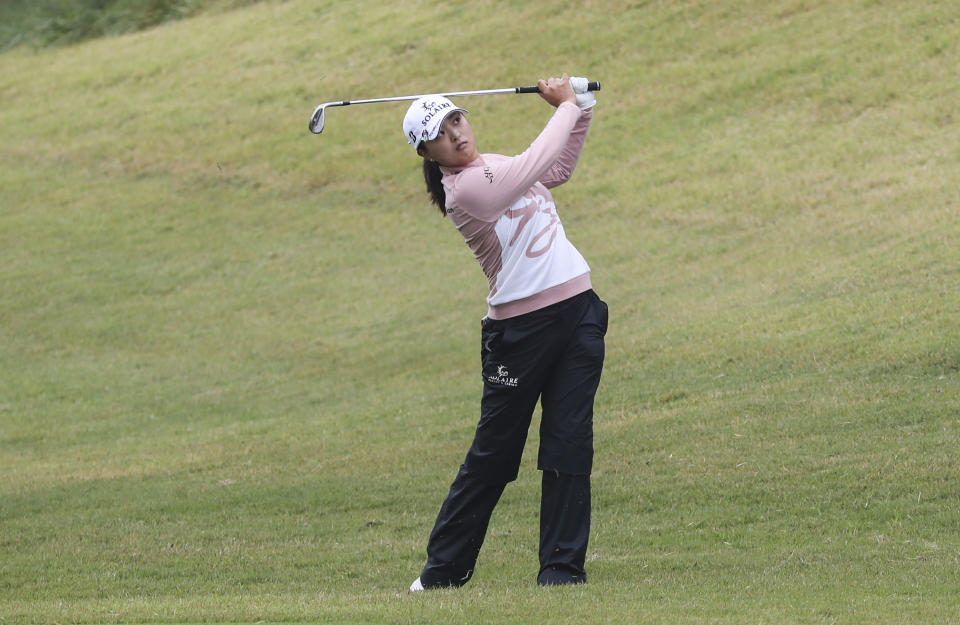 Jin Young Ko of South Korea watches her shot on the ninth hole during the first round of the BMW Ladies Championship at LPGA International Busan in Busan, South Korea, Thursday, Oct. 21, 2021. (Kang Duk-chul/Yonhap via AP)