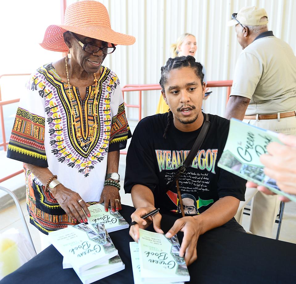 A launch for 'The Green Book' was held at the Fretwell in Spartanburg on July 28, 2022. The book is a guide to African American Cultural Sites in South Carolina.  Brenda Lee Pryce, former South Carolina House Rep. and community leader with Joshua Parks, photographer for the book at the launch.