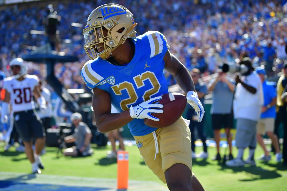 UCLA Bruins wide receiver Keegan Jones celebrates his touchdown scored against the Washington State Cougars during the second half at Rose Bowl.
