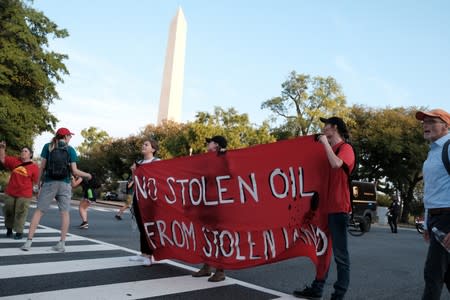 Climate change activists block roads to demand action by U.S. politicians on climate change in Washington D.C.