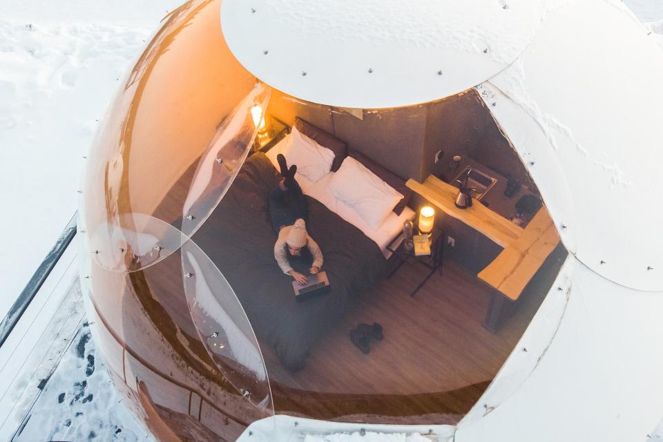 Looking inside an igloo at Borealis Basecamp