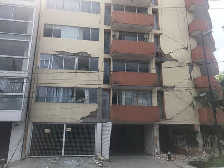 A damaged building is pictured after an earthquake in Mexico City, Mexico, in this September 19, 2017 image from social media. trovatten.com/Social Media/via REUTERS