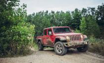 <p>The <a href="https://www.caranddriver.com/jeep/gladiator" rel="nofollow noopener" target="_blank" data-ylk="slk:Jeep Gladiator;elm:context_link;itc:0;sec:content-canvas" class="link ">Jeep Gladiator</a> builds on the four-door Wrangler’s successful, appealing formula by adding a pickup bed to its tail. That also means a stretched wheelbase that seriously improves the everyday ride quality. It’s the easiest Wrangler derivative to use and drive, and that made it a member of <em>C/D’</em>s <a href="https://www.caranddriver.com/features/a29820082/10best-2020/" rel="nofollow noopener" target="_blank" data-ylk="slk:2020 10Best list;elm:context_link;itc:0;sec:content-canvas" class="link ">2020 10Best list</a>. The roof and doors can be removed. An optional disconnecting front anti-roll bar increases axle articulation over uneven terrain, and substantial 33-inch BFGoodrich KM all-terrain (optional) tires look cool and help with traction. Various trims are available up to the Rubicon model, ready to overwhelm most any mountain. The base engine is a 285-hp 3.6-liter V-6 with a six-speed manual transmission, but Jeep recently added a 260-hp 3.0-liter turbodiesel with an eight-speed auto. Gladiator Rubicon and Mojave both offer over 11 inches of ground clearance. </p>