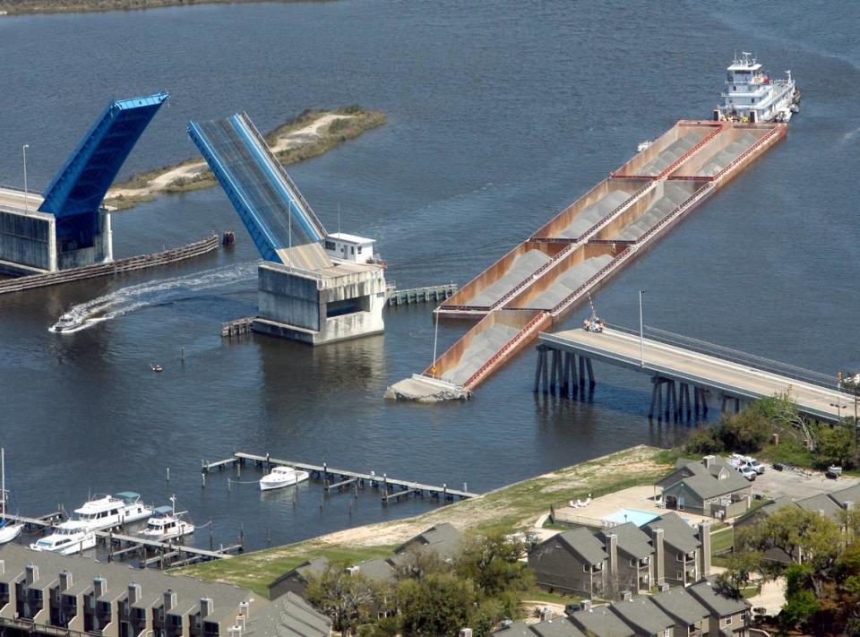 An Aerial photograph of damage to the Popp’s Ferry Bridge after being hit by a barge early Friday morning, March 20, 2009. The barge took out a large section of the span on the south side of the drawbridge.