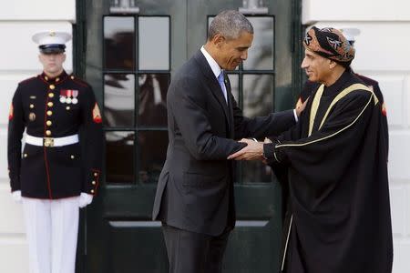 U.S. President Barack Obama (L) welcomes Oman's Deputy Prime Minister Sayyid Fahd bin Mahmoud Al Said as he plays host to leaders and delegations from the Gulf Cooperation Council countries at the White House in Washington May 13, 2015. REUTERS/Jonathan Ernst