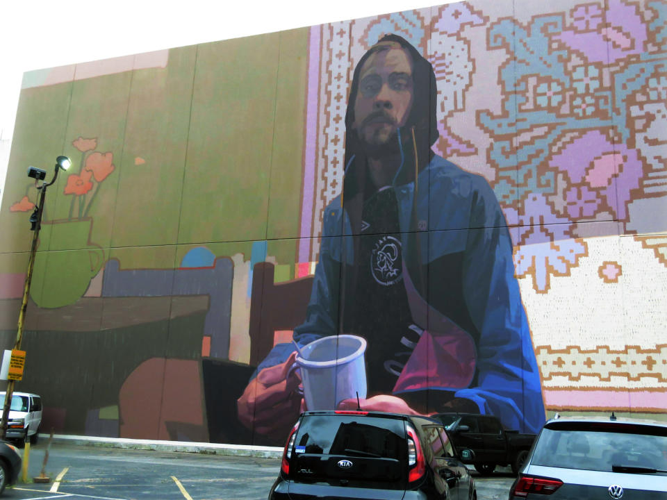 This May 30, 2019, photo shows part of a mural by Polish street artists Sainer and Bezt, for an Arts Council of New Orleans project called "Unframed." The council's executive director, Heidi Schmalbach, says the group wants New Orleans to be known for its contemporary art as much as for its music, food and culture. (AP Photo/Janet McConnaughey)