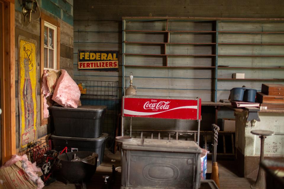 Antiques line the walls of a more than 100-year-old general store in the historic Maury County community of Water Valley on Tuesday, Sept. 14, 2021.