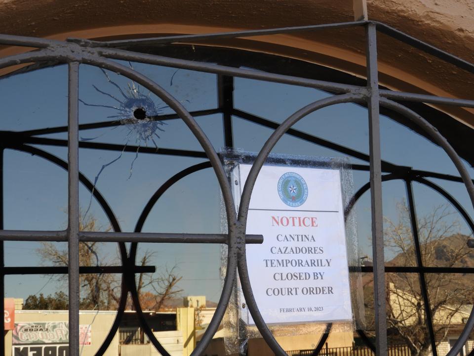 A bullet hole and a notice of a court-ordered closure mark a window at Cazadores Cantina at 3530 Durazno Ave. in South-Central El Paso. A temporary restraining order shuttered the bar on Friday due to repeat allegations of criminal activity at the bar, including gun violence.