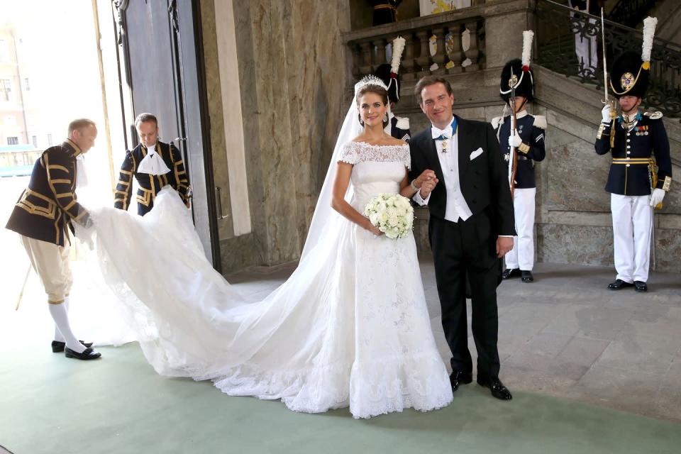 <p>Princess Madeleine and Christopher O'Neill of Sweden were married in Stockholm on June 8, 2013. Designed by Valentino, Princess Madeleine's gown had a wide neckline, short sleeves, a deep-cut back, and an emphasized waist. The dress was made from pleated silk organza with Chantilly lace.</p>