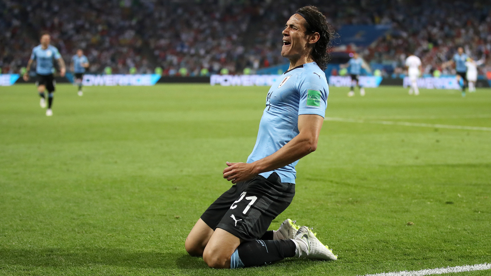 Cavani celebrates after scoring the opening goal against Portugal