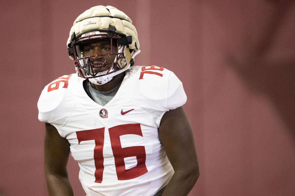 Florida State offensive lineman Darius Washington (76) warms up as FSU football players work on their skills during practice Thursday, Sept. 8, 2022.