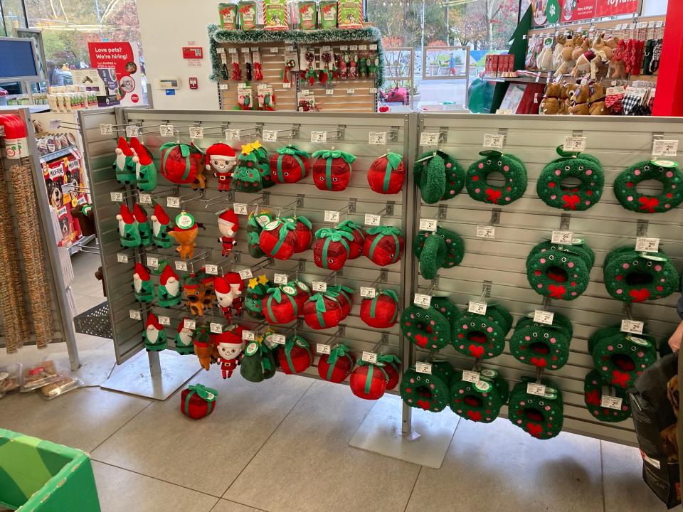 Holiday-themed pet iems on display in the checkout line at PetSmart.