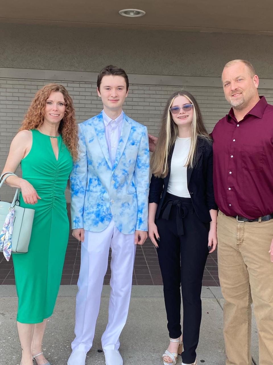 Hailey's brother Skyler (second from left) has graduated from Powell High School, but still helped with the music to the routines.