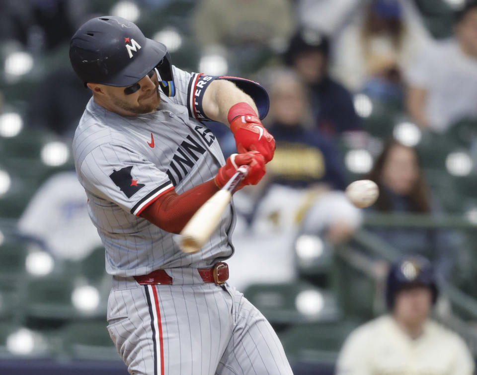 Minnesota Twins' Ryan Jeffers hits a three-run home run during the seventh inning of a baseball game against the Milwaukee Brewers Wednesday, April 3, 2024, in Milwaukee. (AP Photo/Jeffrey Phelps)