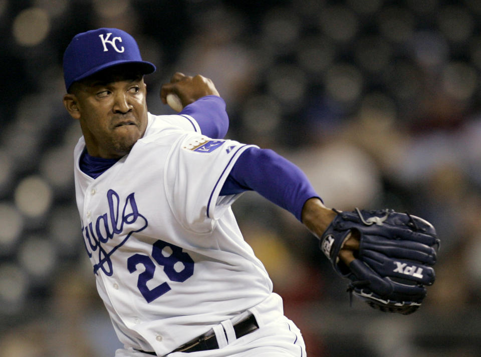 FILE - In this May 23, 2007 file photo, Kansas City Royals closer Octavio Dotel pitches during the ninth inning of a baseball game against the Cleveland Indians, in Kansas City, Mo. Authorities in the Dominican Republic arrested on Tuesday, Aug. 20, 2019, the former MLB pitcher and are searching for ex-infielder Luis Castillo for their alleged links to a drug-trafficking and money-laundering ring in the Caribbean and United States. (AP Photo/Charlie Riedel, File)